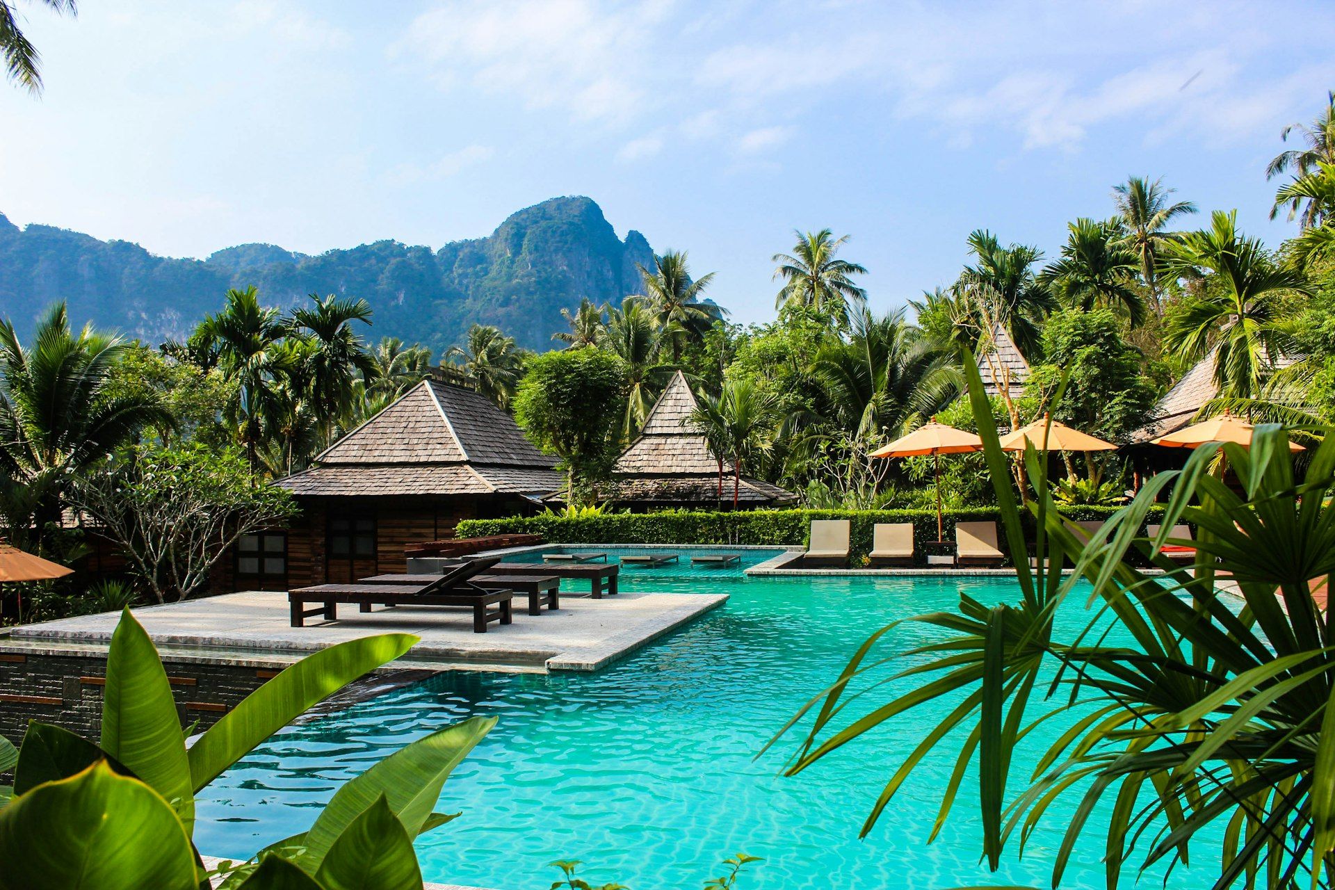 Clifftop pool at The Aster overlooking the Andaman Sea at dusk